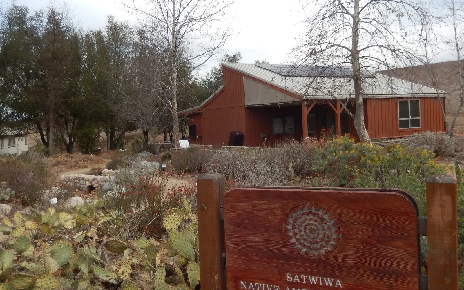 Satwiwa Native American Indian Culture Center in the Santa Monica Mountains, Newbury Park, California, showing the cultural center building surrounded by oak woodland landscape